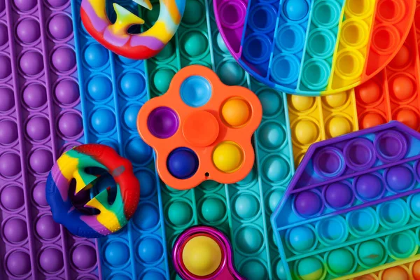 Trendy Pop it Fidget toys. New popular colorful anti stress pop it toys of various shapes. Simple dimple.