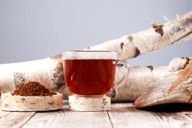 Bir fincan Chaga çayı. Güçlü antioksidan, bağışıklık sistemini güçlendirir, detoks kalitesine sahiptir, sindirim sistemini geliştirir..