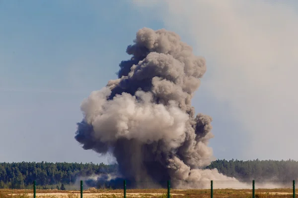 An explosion after a bombing at a military airfield. — Stock Photo, Image