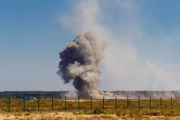 An explosion after a bombing at a military airfield. — Stock Photo, Image