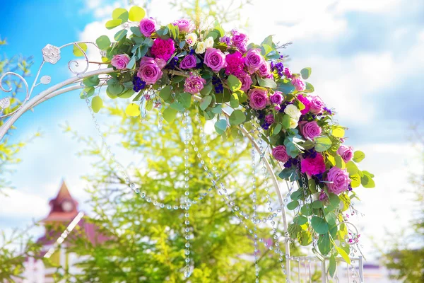 Arch for the wedding ceremony. Floristic composition in vintage