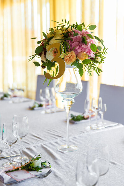 Floral arrangement for decoration wedding table for guests. Room