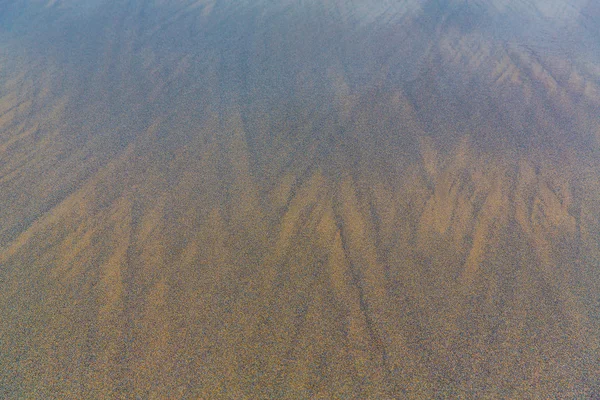 Strand Sand Hintergrund. — Stockfoto