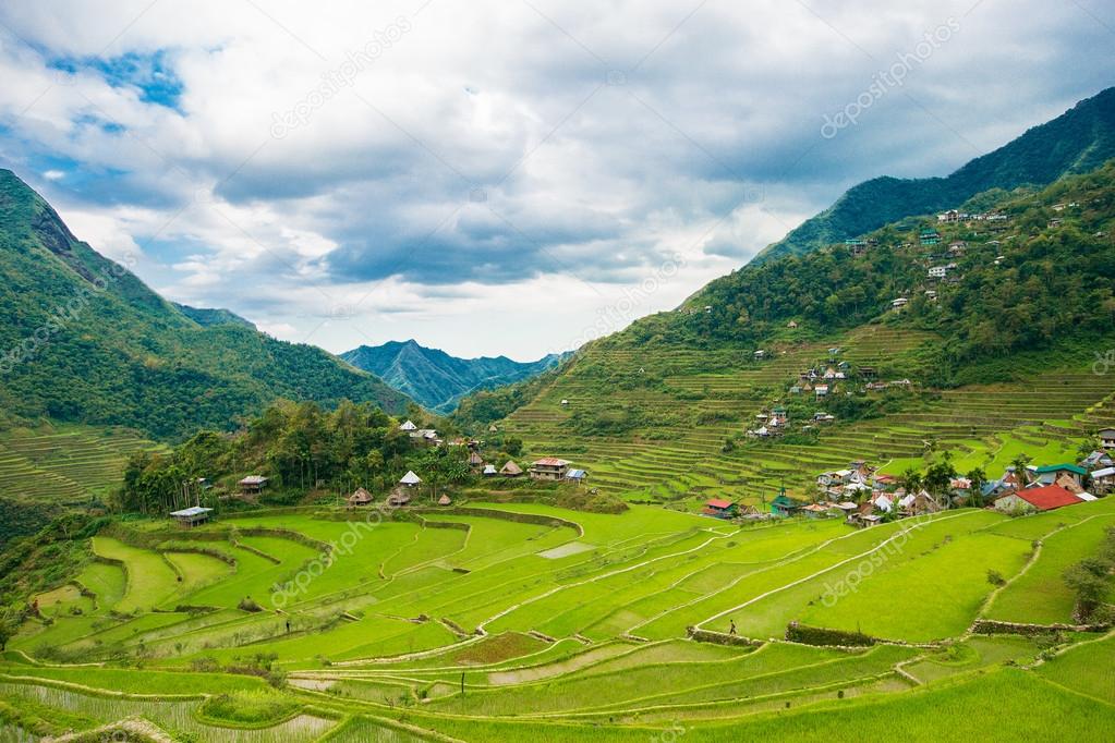 Rice terraces in the Philippines. The village is in a valley amo