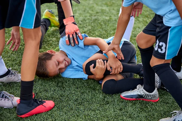 friendly team support their friend having ache in legs