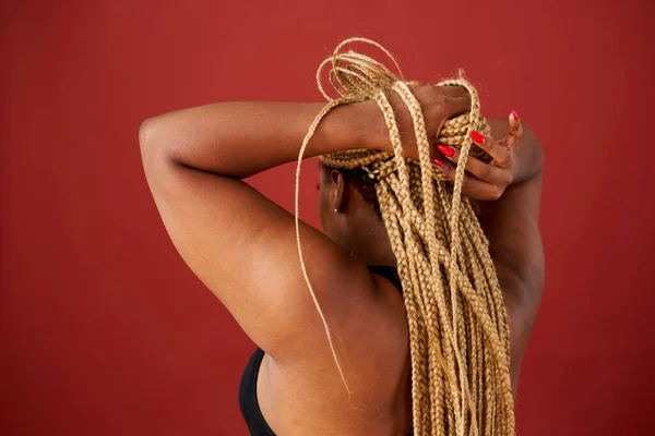 chubby african american woman tie a tail, afro braids