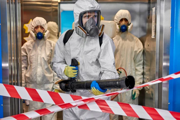 Spraying disinfectants for cleaning inside the building — Stock Photo, Image
