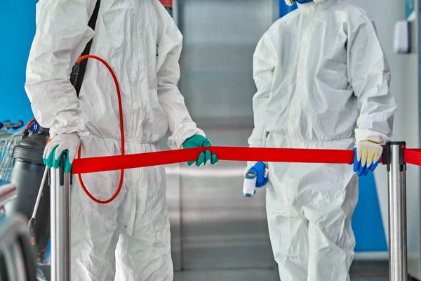 Disinfectants tie the quarantine area with warning tape — Stock Photo, Image