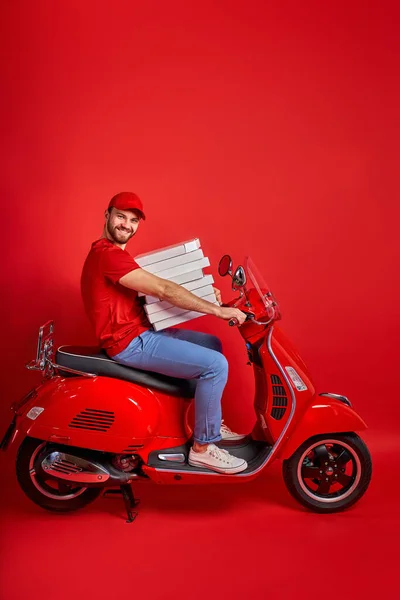 delivery courier man on scooter with driving fast to customers, holding orders