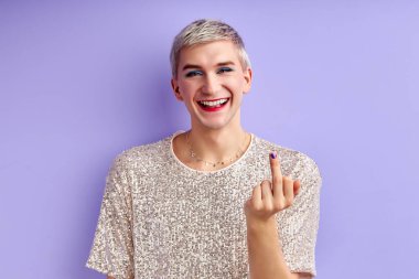 gay with fresh nail polish show fuck gesture on camera clipart