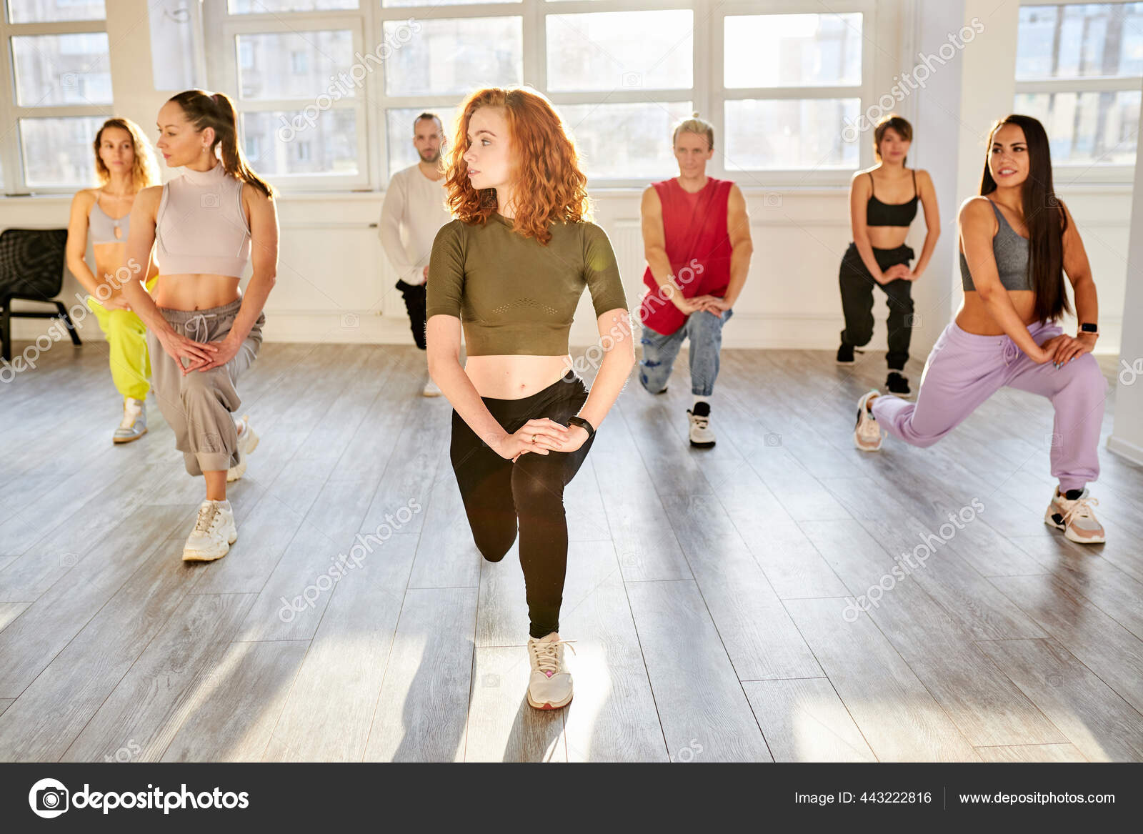 Sportive hip hop dancers stretching body before dance Stock Photo