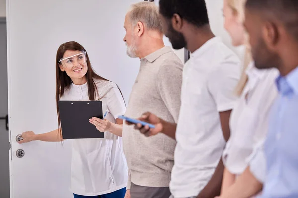 Head physician calls patients according to list to office