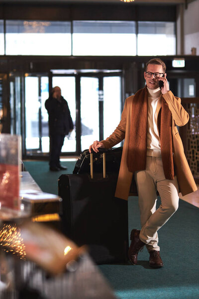 Confident Male In Trendy Coat Go To Reception, Taking Luggage