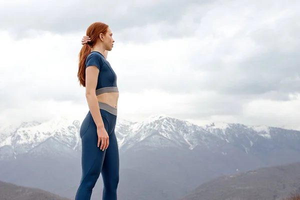 Side view redhead woman tired, resting after the run. sports on fresh air, outdoors — Stock Photo, Image