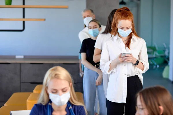 Patients in an office wearing medical mask waiting for queue for vaccine — Stock Photo, Image