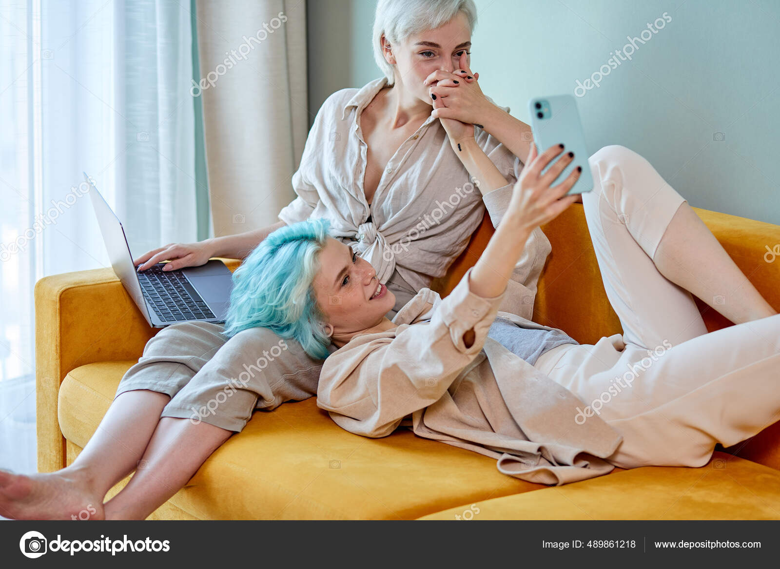 Lgbt Lesbian Couple Best Girlfriends Having Rest At Home On Sofa Take Photo On Smartphone Stock
