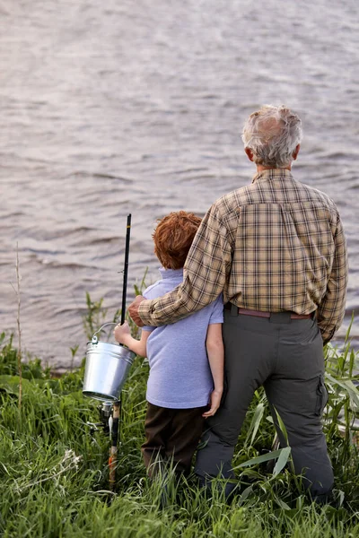 Rear View On Handsome Elderly Man Came To Fish With Grandson, Looking At River — Fotografia de Stock