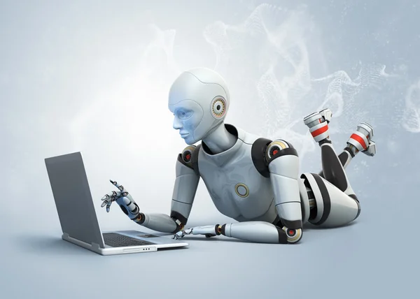 Robot lying on floor and using laptop — Stock Photo, Image