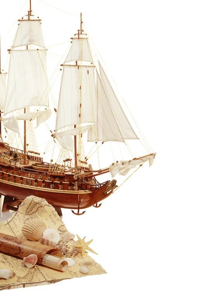 Model of sailing ship with a map — Stock Photo, Image