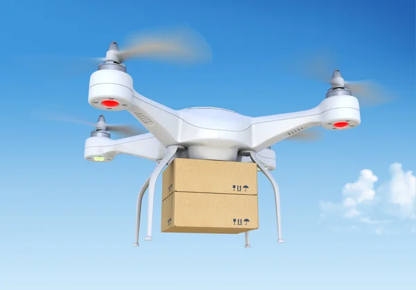 Quadrocopter drone  delivering package — Stock Photo, Image