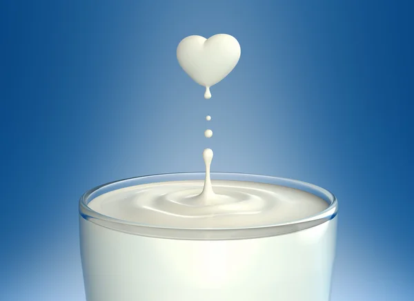 Gota de leche en forma de corazón — Foto de Stock