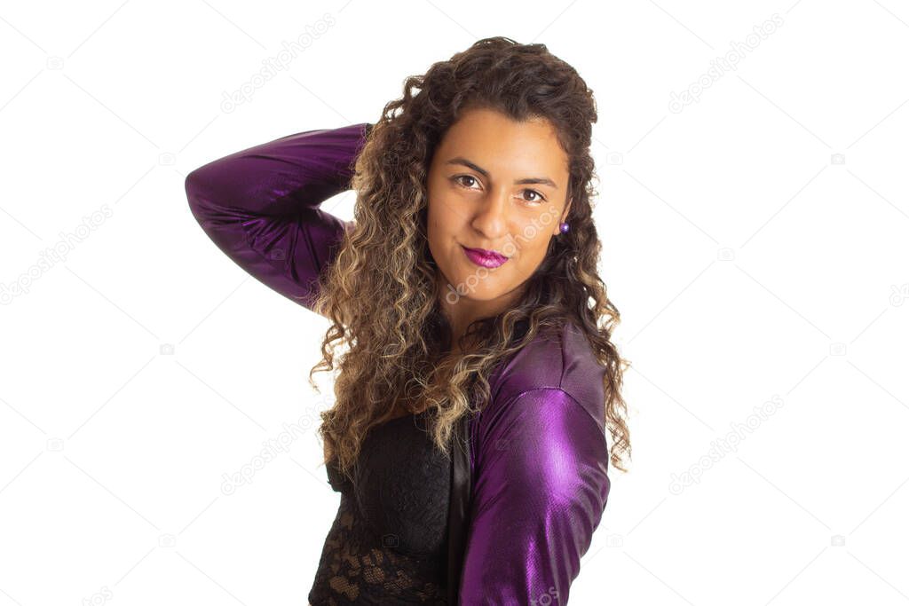 Portrait of a young woman looking at the camera.  Black girl wearing purple clothes and makeup party.