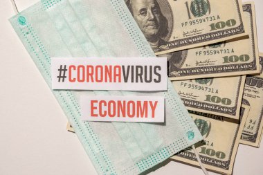 Corona virüsünün Avrupa ekonomisi ve Amerikan ekonomisi üzerinde etkisi, tıbbi maske ve metin ile banknotlar