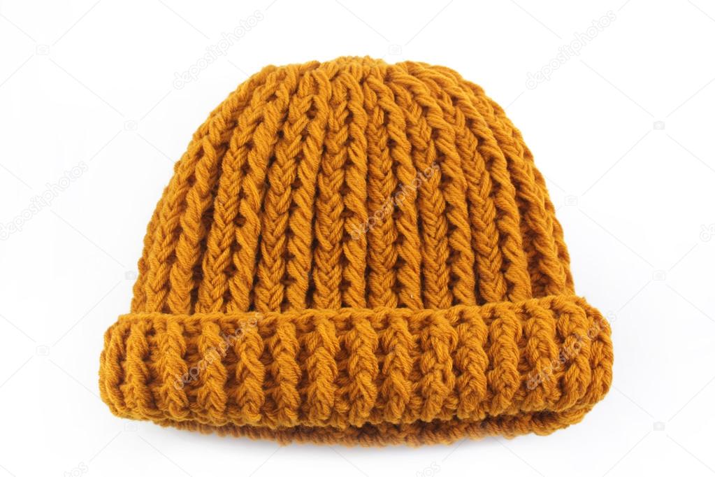 Yellow knitted wool hat isolated on white background