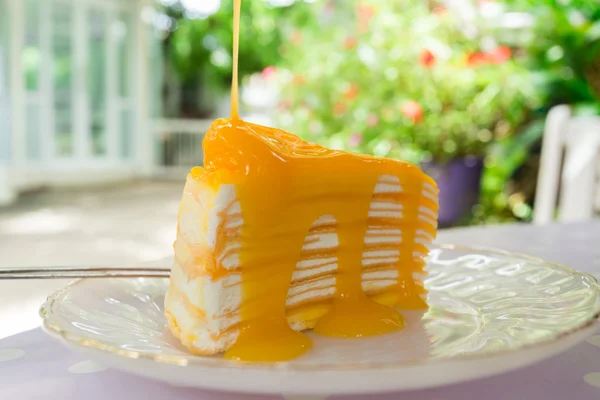 Orange cake bokeh background — Stock Photo, Image