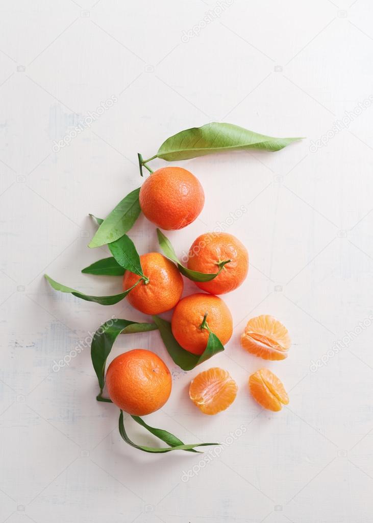 Sweet tangerines with leaves