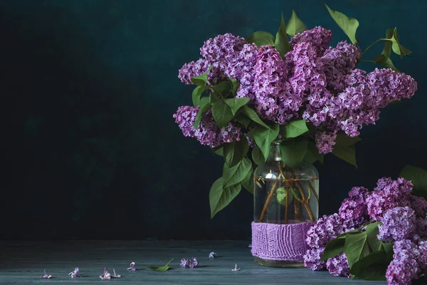 Abundant Arrangement Freshly Cut Purple Lilacs Clear Glass Vase Wooden — Stock Photo, Image