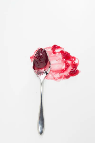 Sour cherry jam on spoon — Stock Photo, Image