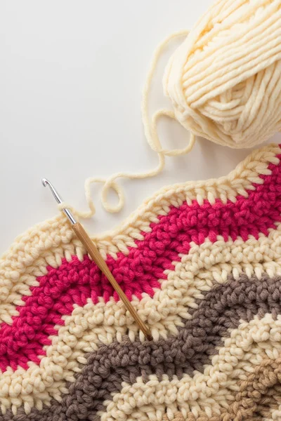 Crochet hook with crocheted blanket — Stock Photo, Image