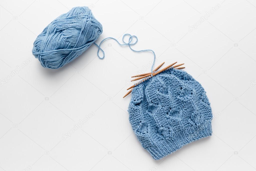 Knitted Hat with knitting needles