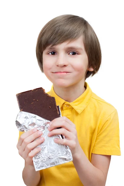 Niño feliz con chocolate —  Fotos de Stock