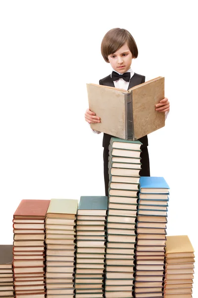 Boy standing with books — Stock Photo, Image