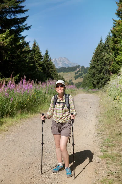 Female tourist with backpack — Stock Photo, Image