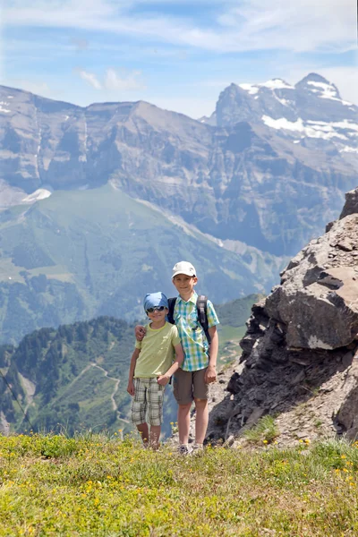 Boys in summer mountains — Stock Photo, Image