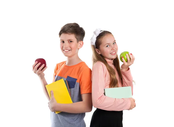 Boy and girl  with textbooks in hand — Stock Photo, Image