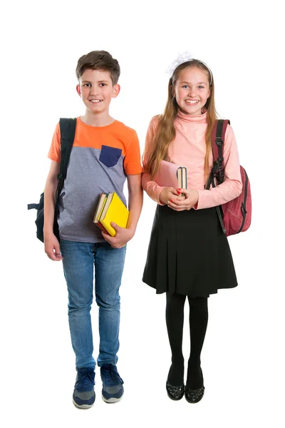 A schoolgirl and schoolboy with books — Stock Photo, Image