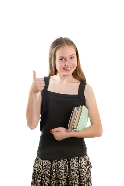 Girl with books giving thumb up — Stock Photo, Image