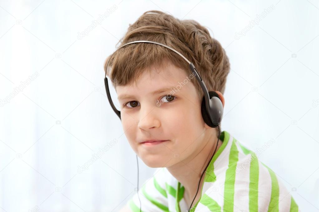 Young boy listening music