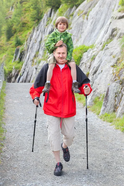 Grandfather with grandson on mountain — Stock Photo, Image