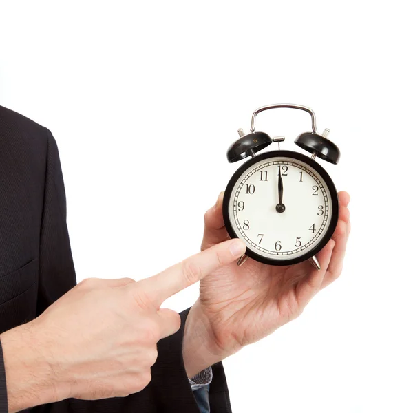 Pointing finger on clock — Stock Photo, Image