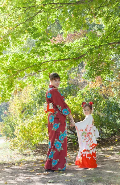 Woman and little girl in kimono — Stock Photo, Image