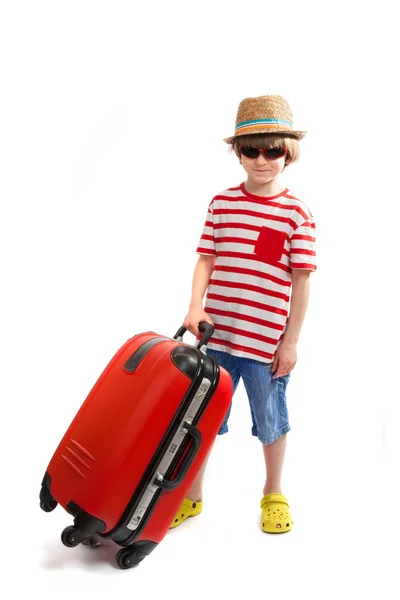 Small  tourist with a red suitcase — Stock Photo, Image