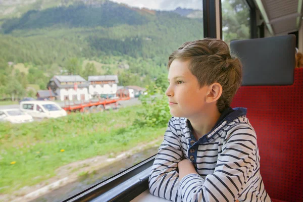 Child is traveling in a train — Stock Photo, Image