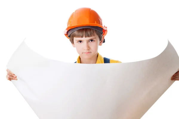 Ragazzino in hardhat con cianografia — Foto Stock