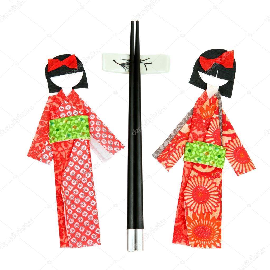 japanese paper dolls and chopsticks