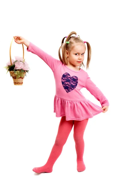 Little girl playing with basket — Stock Photo, Image